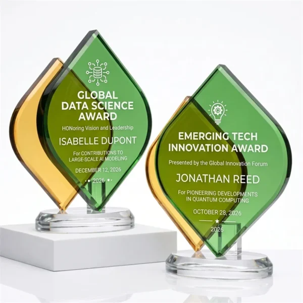 Modern crystal awards with overlapping green and amber leaf shapes