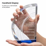 Handheld curved sail crystal trophy showing actual scale