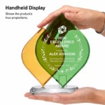 Handheld dual-leaf crystal trophy showing scale