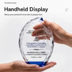 Handheld flame-shaped crystal award showing true proportions