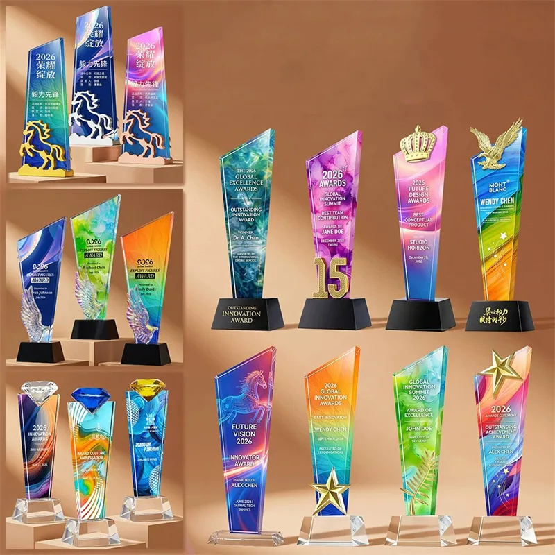 Colourful corporate crystal awards with stars crowns eagles and decorative bases