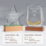 Custom crystal awards with star and monument designs on solid wood bases