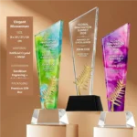 Elegant Momentum crystal awards in 25 27 and 29 cm sizes with gold leaf decoration